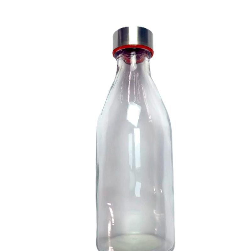 Botella de vidrio transparente con tapa metálica de rosca.